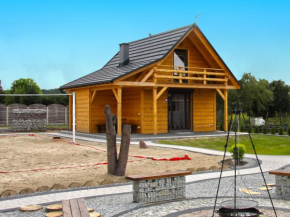 A wooden, eco-friendly house by the Goszcza lake